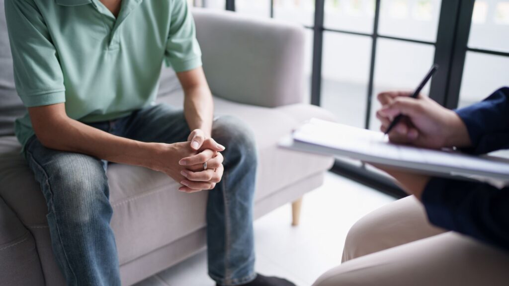seated in a therapy chair